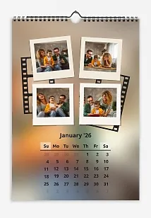 Calendar template of a cheerful family in Polaroid photographs with film strips and a blurred background of one of their photographs.