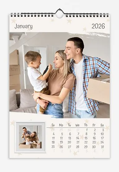 A calendar template with a light starry background featuring photos of a young family and their son with torn edges and a framed wall photo.