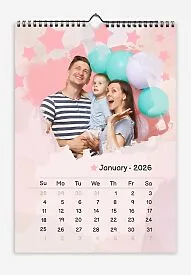 A free calendar template featuring a joyful young family with a son, featuring stars and balloons. The photo features grunge edges, a pastel background, and a playful font.