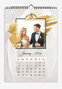 Calendar template Wedding photos of the bride and groom against the backdrop of a veil with a gold brushstroke and wedding rings.