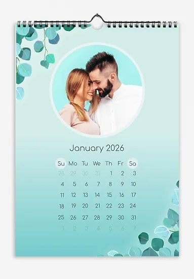 A fresh calendar template featuring a young couple on a menthol background with tree branches.