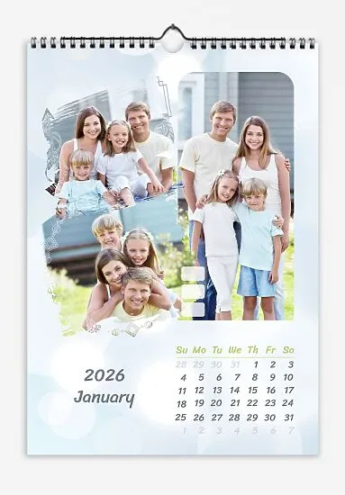 Calendar template with family photos. Rounded and brushed photographs on a light background with bokeh.