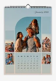 A calendar template featuring a family by the sea at sunset. An organized collage with large and small photos. The text is in handwritten fonts.