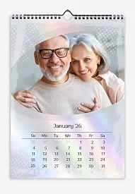 A calendar template for an elderly couple featuring reflected sun rays, tilted oval photos, and a grunge translucent frame.