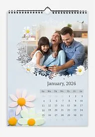 A calendar template featuring a loving family and daisies on a soft blue background. Large oval photos with a floral border.