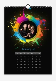 A calendar template featuring "Family photos with splashes of colorful paint" on a contrasting black background.