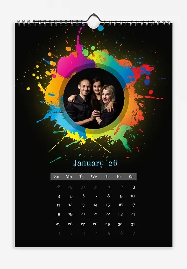 A calendar template featuring "Family photos with splashes of colorful paint" on a contrasting black background.