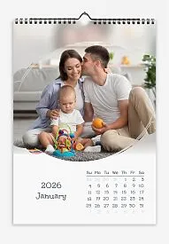 Modern white calendar with photo templates. Oval photos of happy family with blurred background.