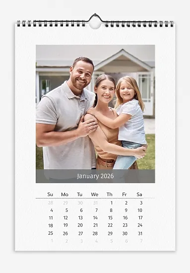 A simple, classic calendar template for a "Happy Family with a Daughter" with a mat and large rectangular photos.